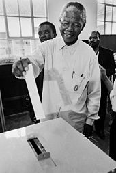 https://upload.wikimedia.org/wikipedia/commons/thumb/7/73/Mandela_voting_in_1994.jpg/170px-Mandela_voting_in_1994.jpg